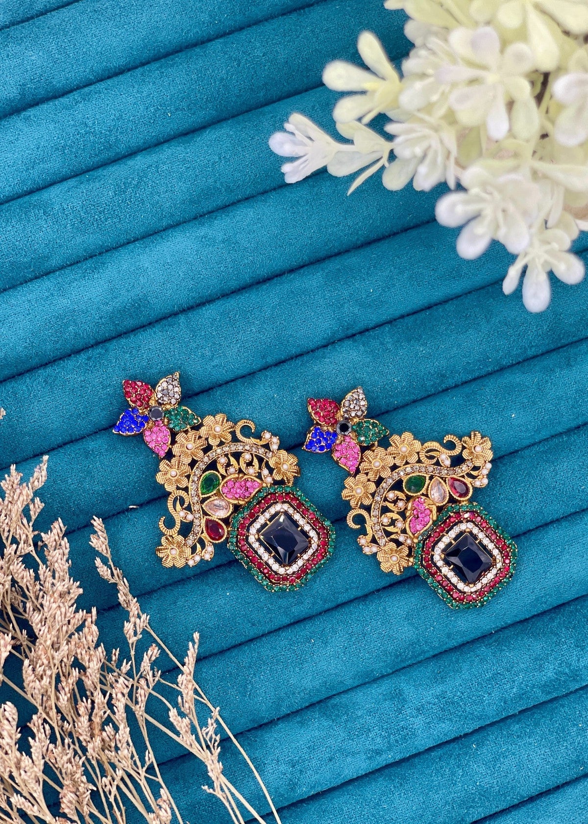Shop the Celeste Radiant Drop Earrings from Zarosh Jewel