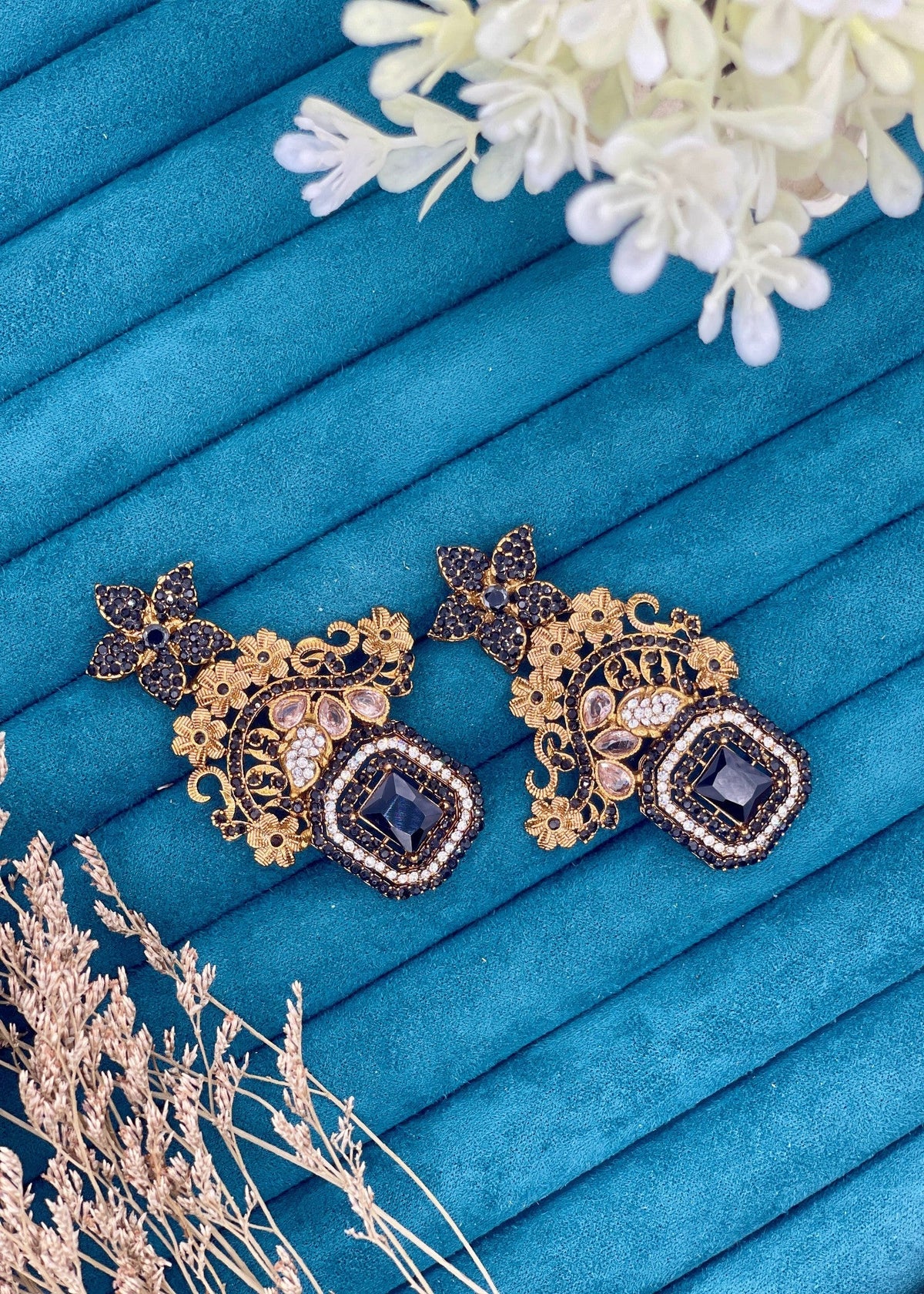 Shop the Celeste Radiant Drop Earrings from Zarosh Jewel