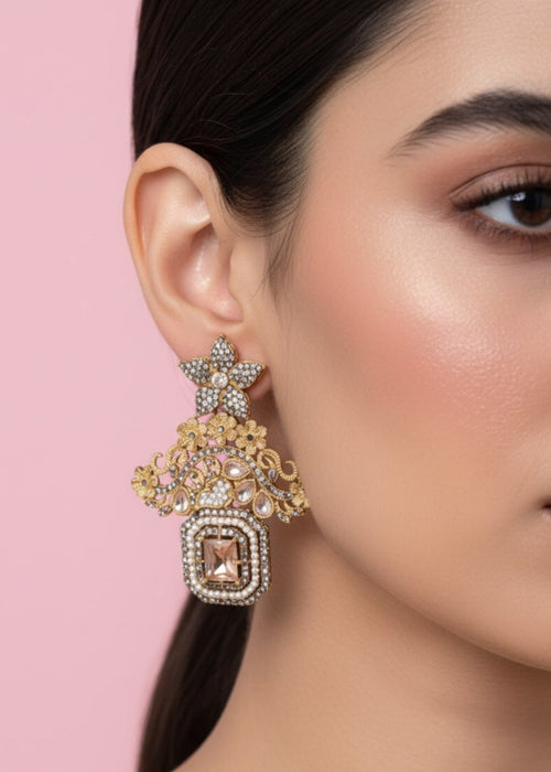 Shop the Celeste Radiant Drop Earrings from Zarosh Jewel