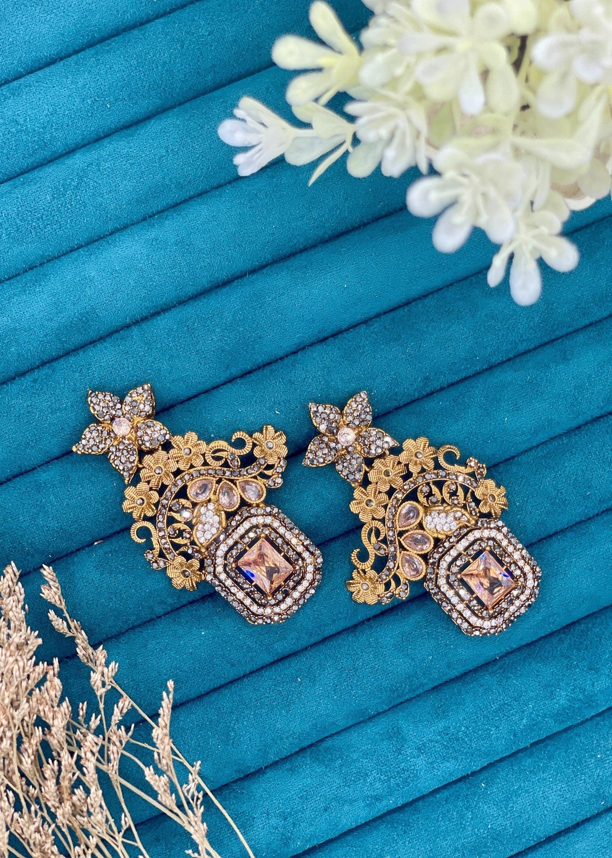 Shop the Celeste Radiant Drop Earrings from Zarosh Jewel