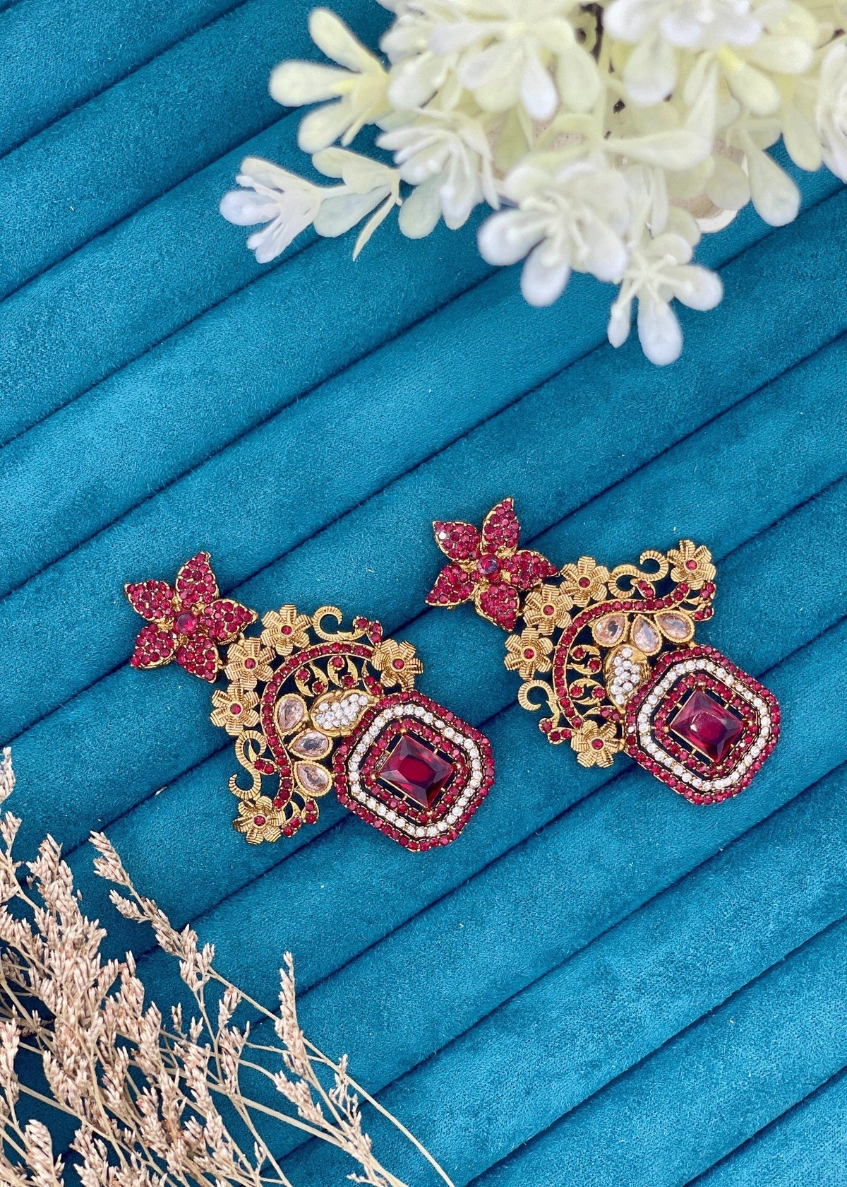 Shop the Celeste Radiant Drop Earrings from Zarosh Jewel