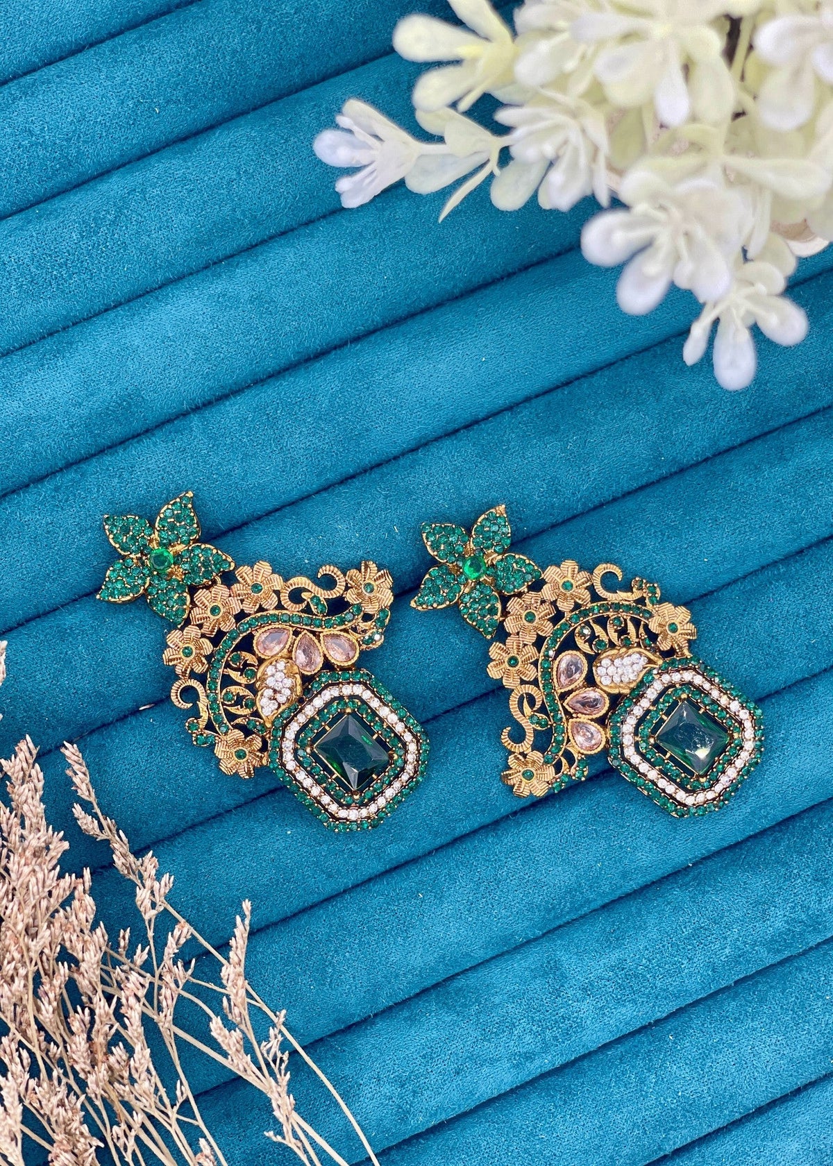 Shop the Celeste Radiant Drop Earrings from Zarosh Jewel