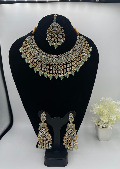 Shop the Emerald Opulence Bridal Jewellery Set from Zarosh Jewel