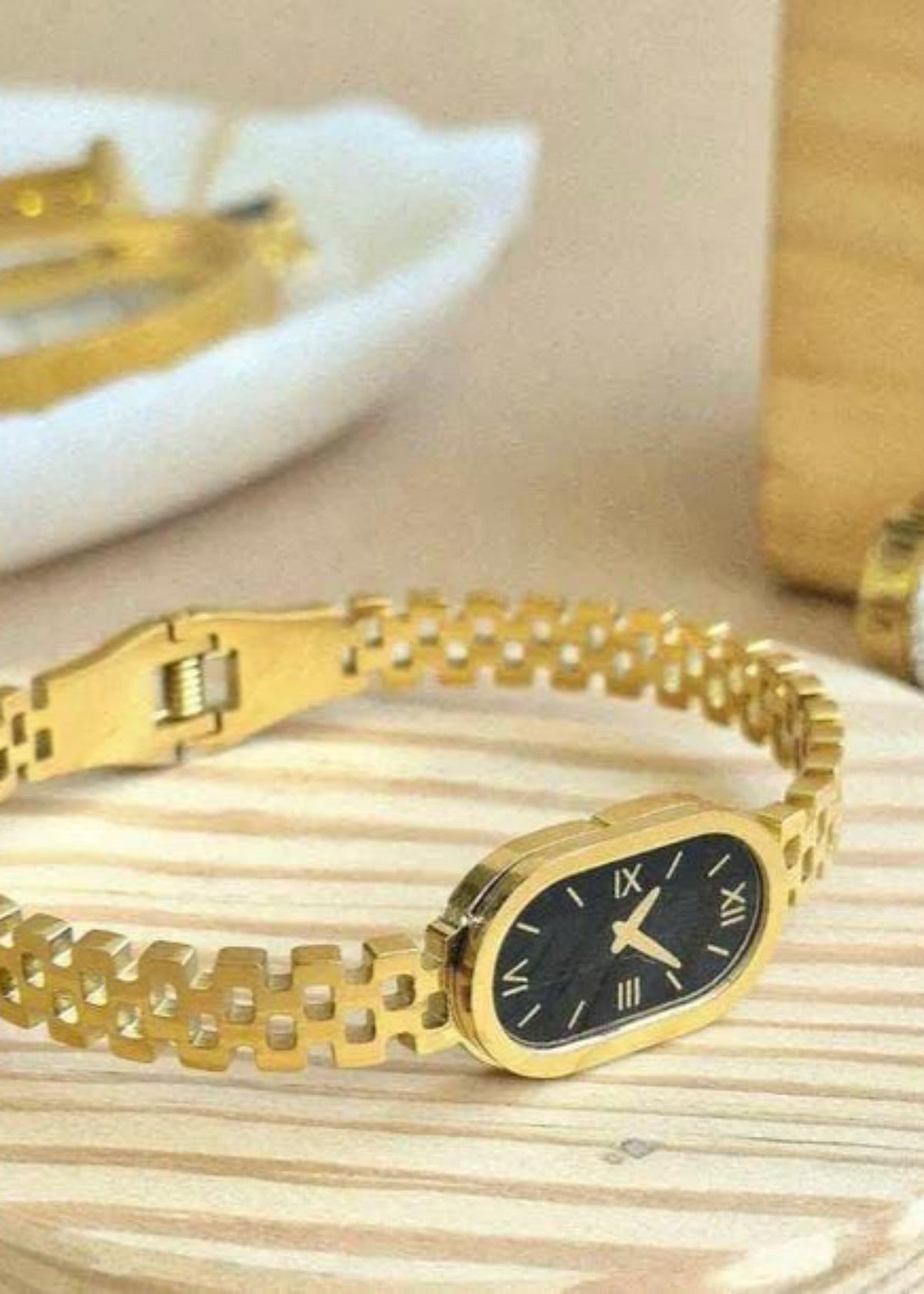 Shop the Golden Noir Watch-Style Bracelet from Zarosh Jewel