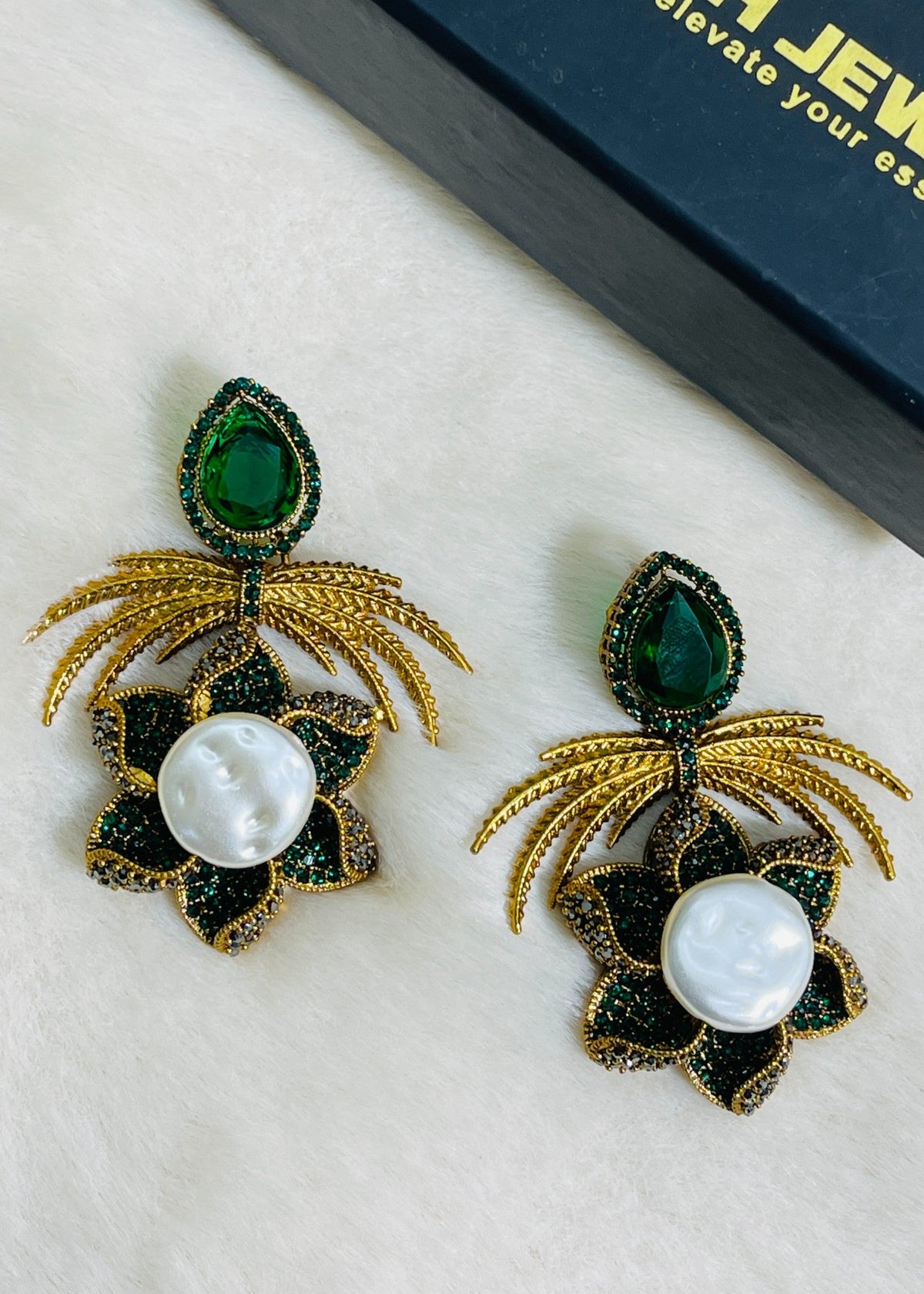 Shop the Grand Statement Earrings from Zarosh Jewel