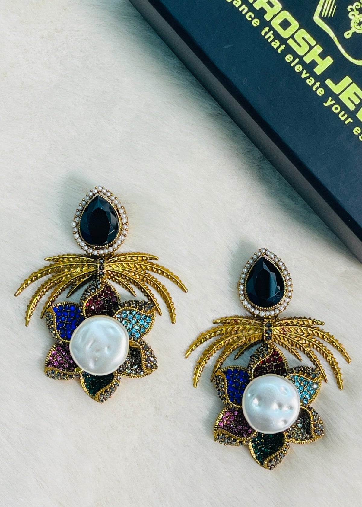 Shop the Grand Statement Earrings from Zarosh Jewel