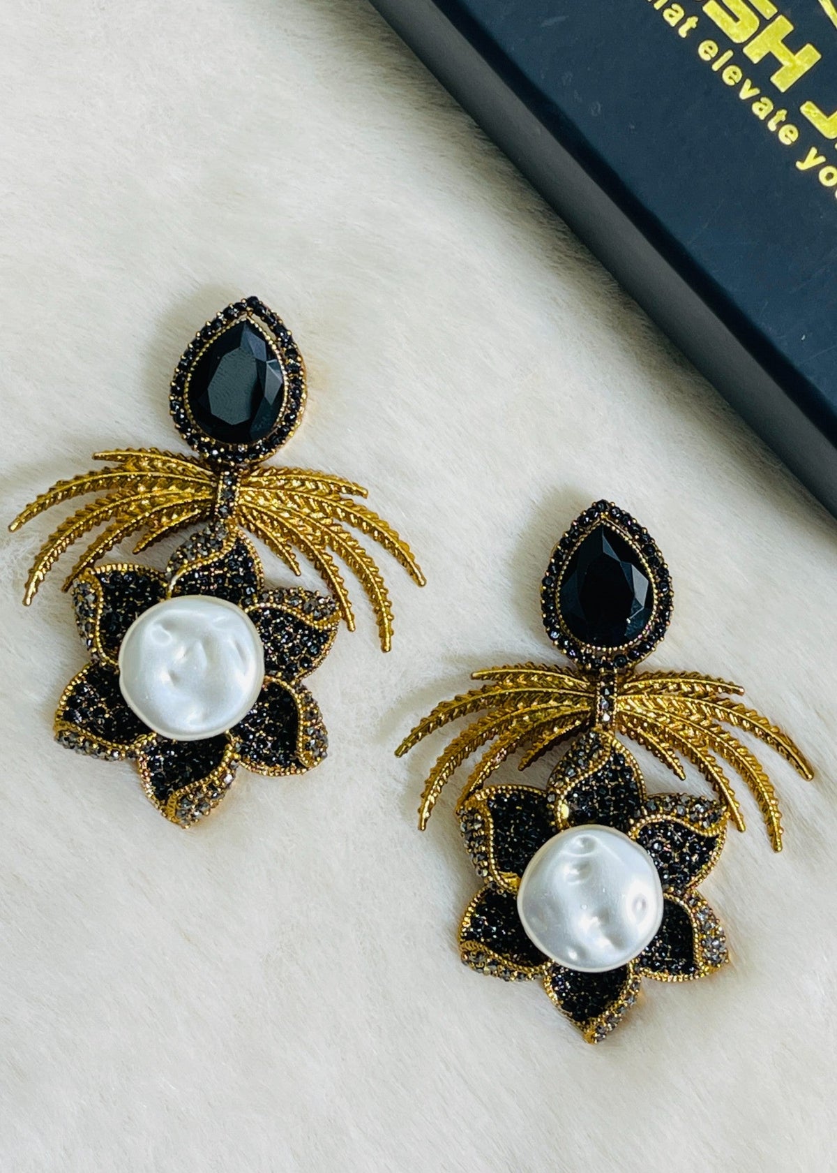 Shop the Grand Statement Earrings from Zarosh Jewel