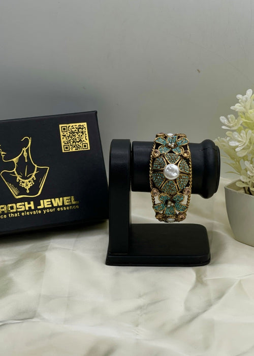 Shop the Hoor Floral Bangle from Zarosh Jewel