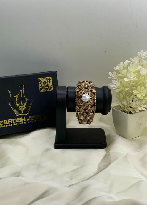 Shop the Hoor Floral Bangle from Zarosh Jewel