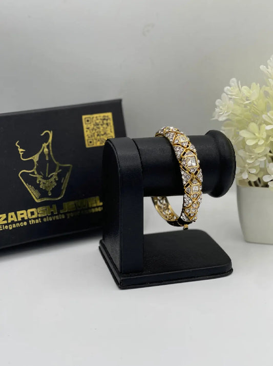 Mira Spiral Bangle