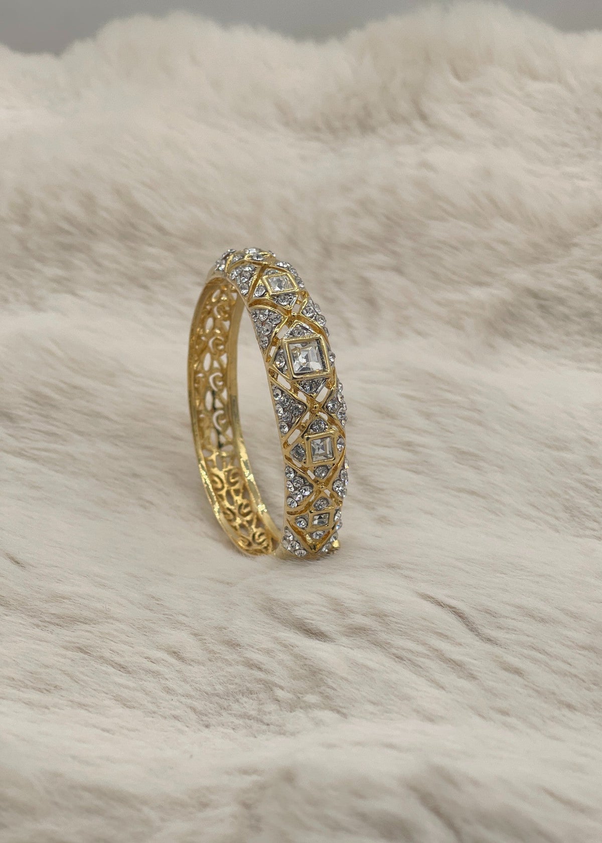 Shop the Mira Spiral Bangle from Zarosh Jewel