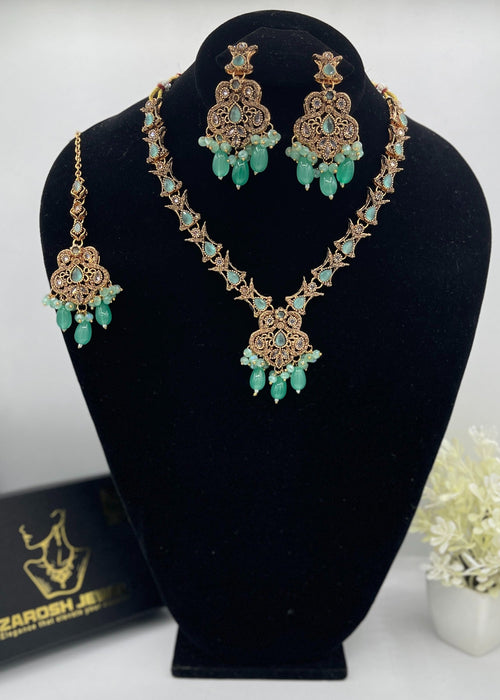 Shop the Nayab Luxe Necklace set from Zarosh Jewel