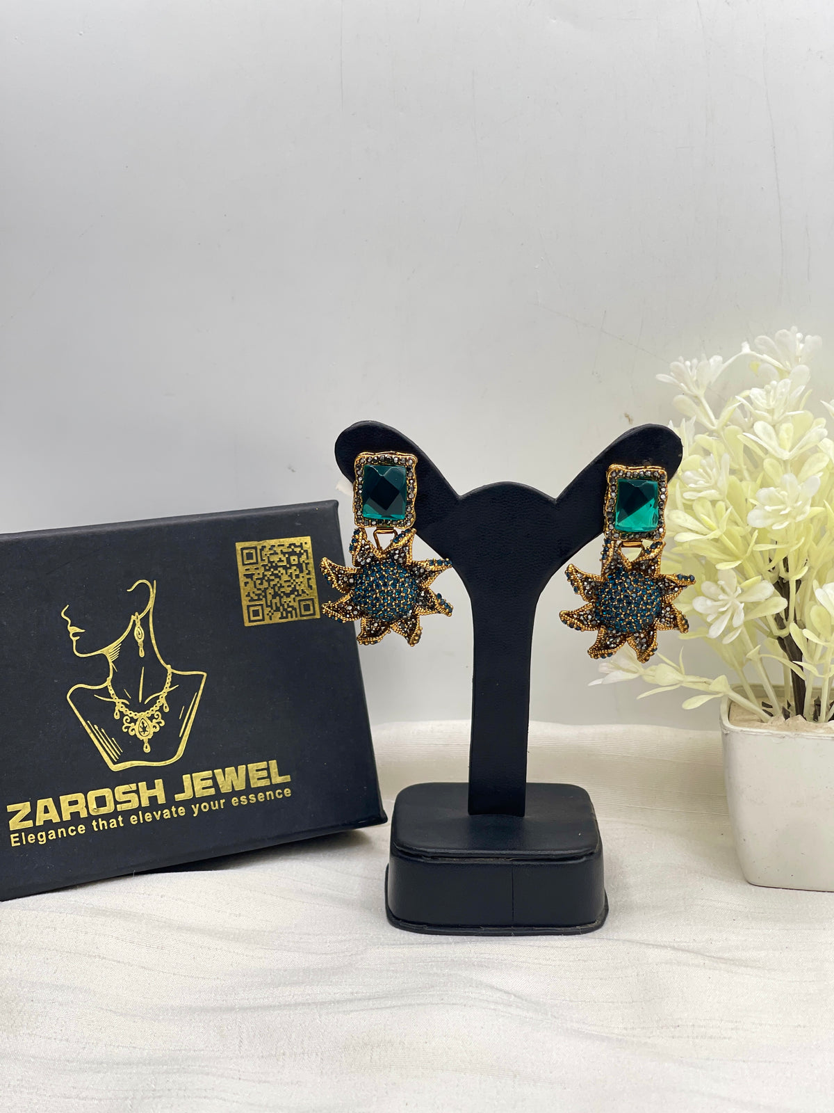 Shop the Nimra Stellar Droplet Earring from Zarosh Jewel
