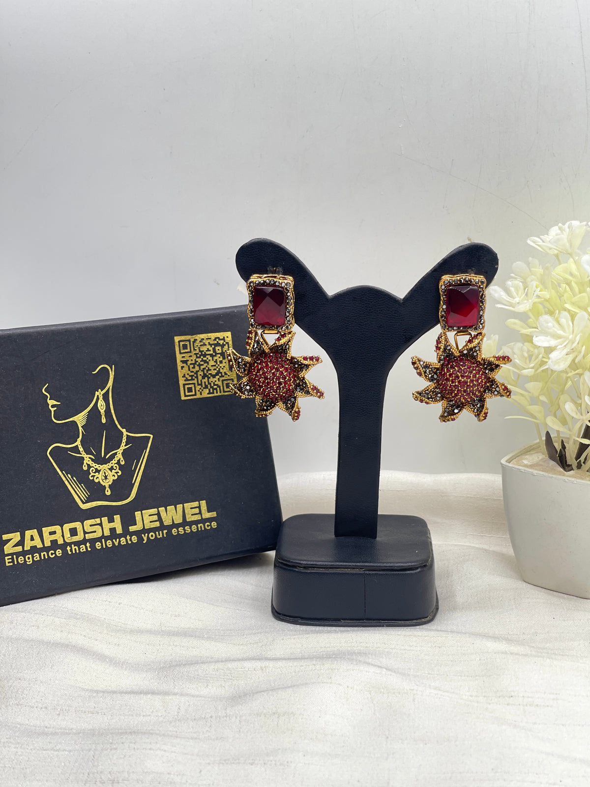 Shop the Nimra Stellar Droplet Earring from Zarosh Jewel