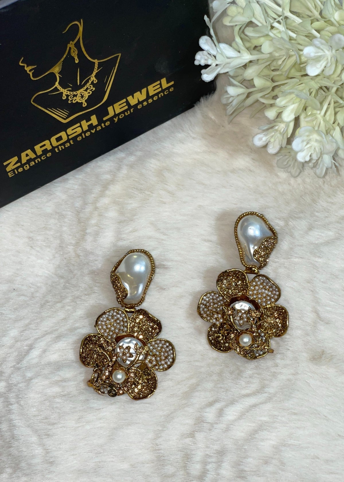 Shop the Noore Floral Pearl Earrings from Zarosh Jewel