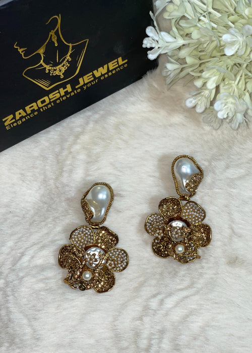 Shop the Noore Floral Pearl Earrings from Zarosh Jewel