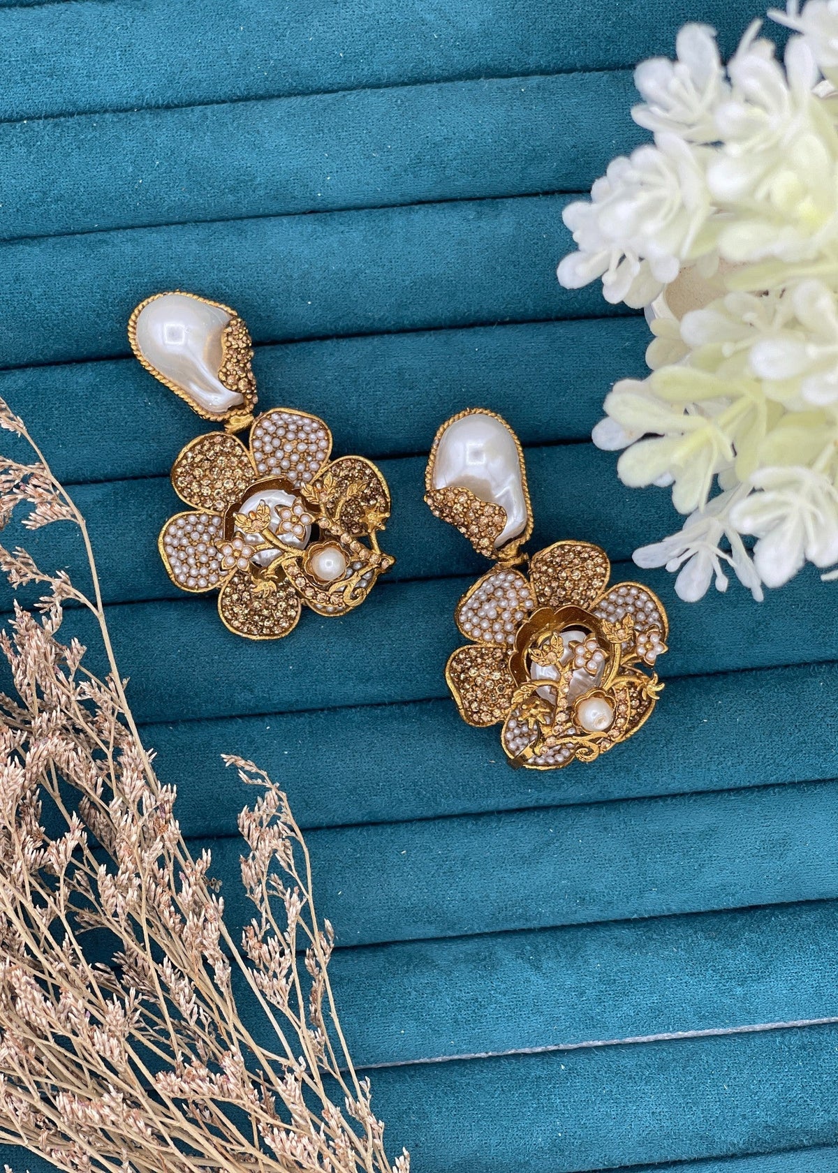 Shop the Noore Floral Pearl Earrings from Zarosh Jewel