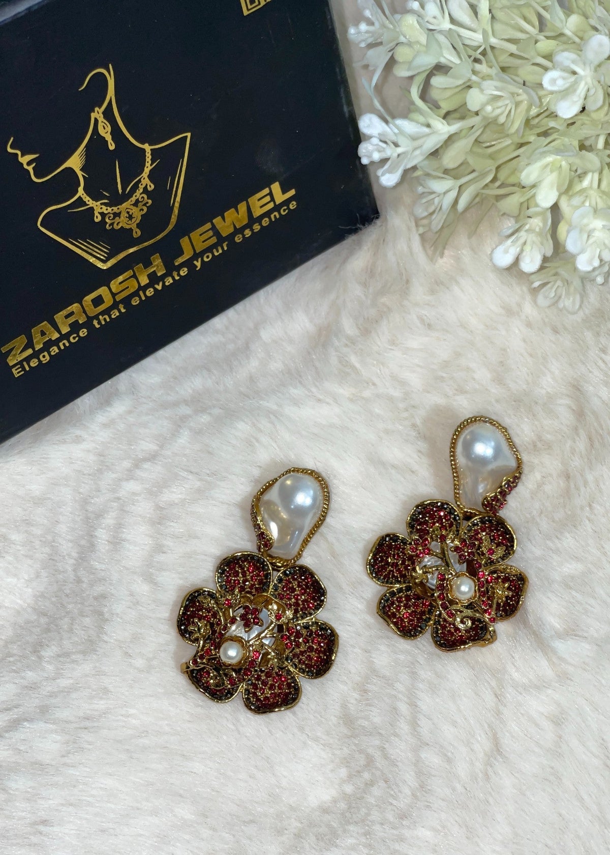Shop the Noore Floral Pearl Earrings from Zarosh Jewel