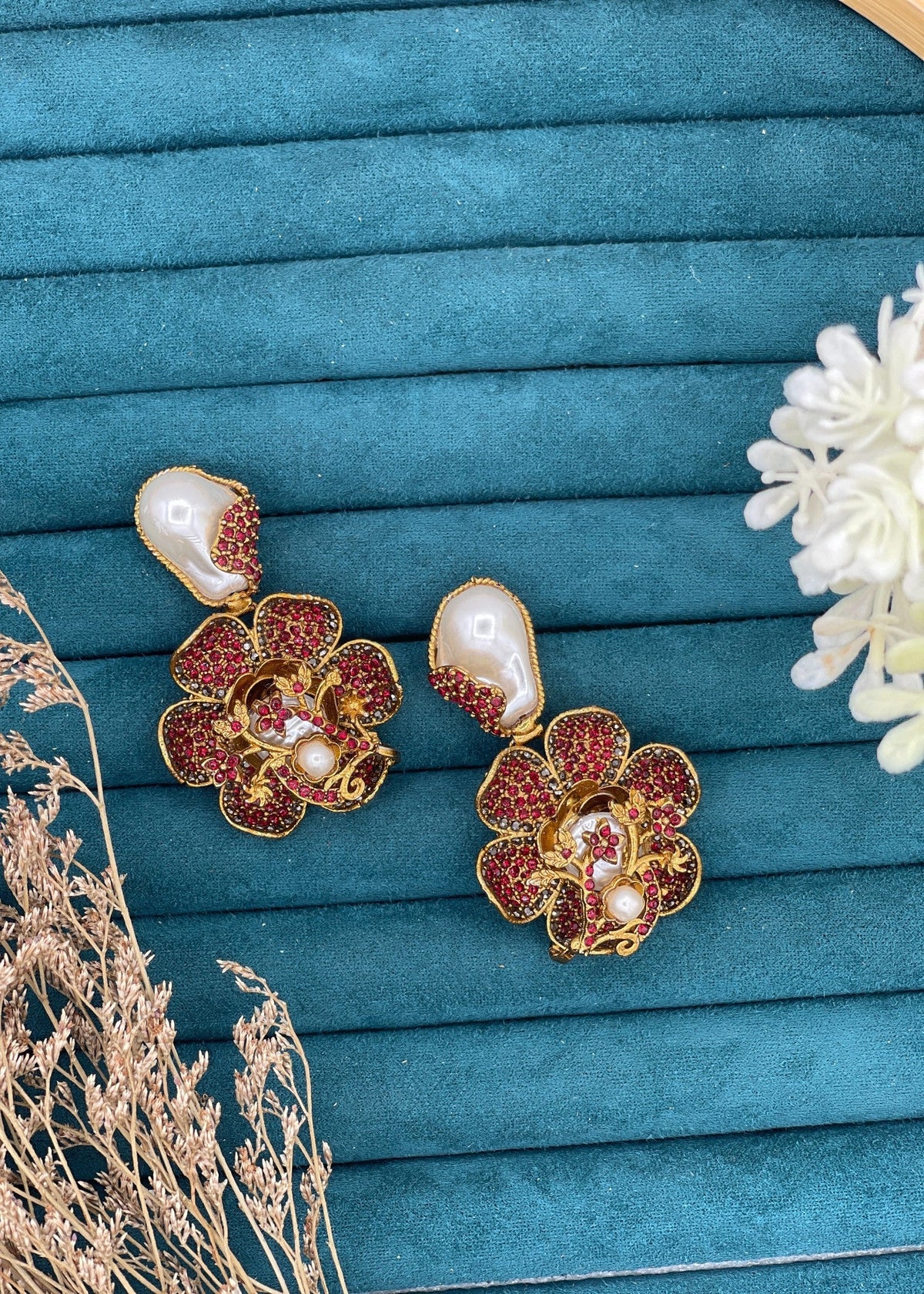 Shop the Noore Floral Pearl Earrings from Zarosh Jewel