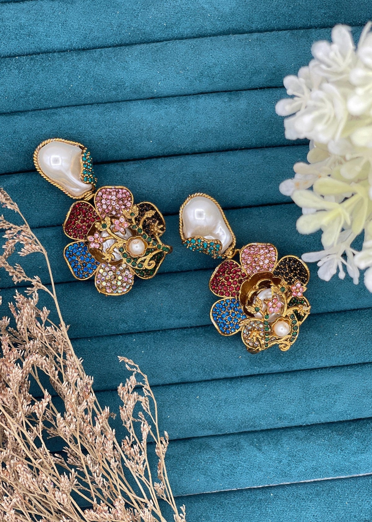 Shop the Noore Floral Pearl Earrings from Zarosh Jewel