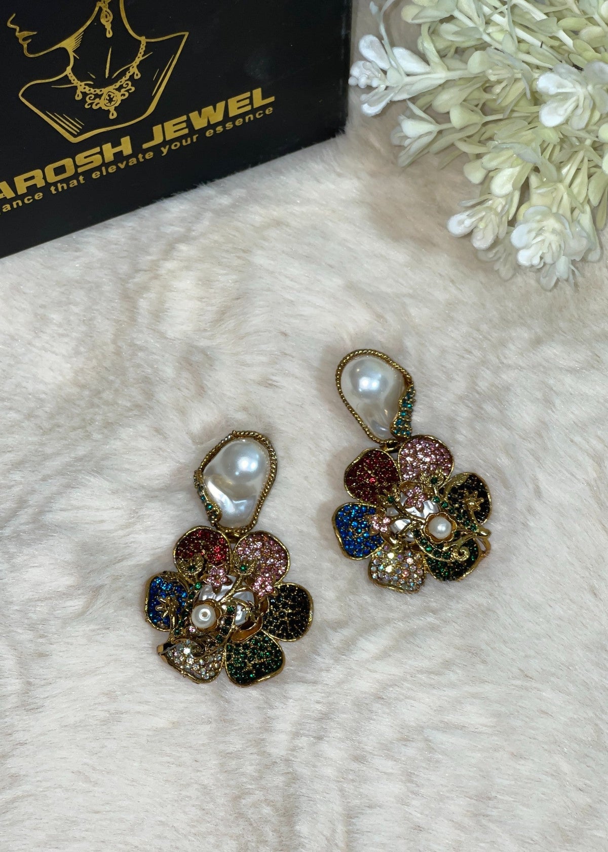Shop the Noore Floral Pearl Earrings from Zarosh Jewel