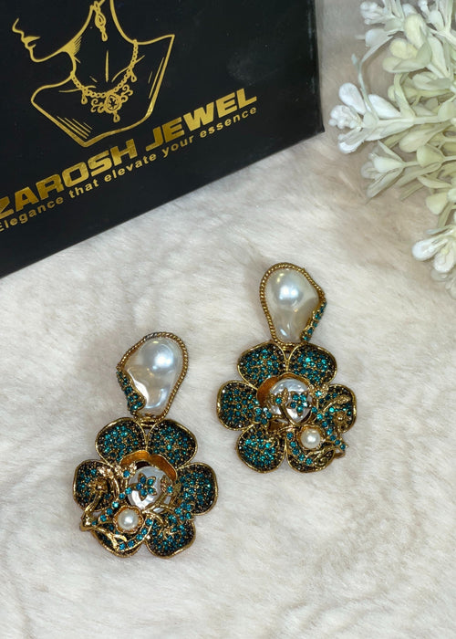 Shop the Noore Floral Pearl Earrings from Zarosh Jewel