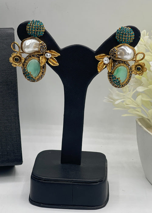 Shop the Nudhar Earrings from Zarosh Jewel