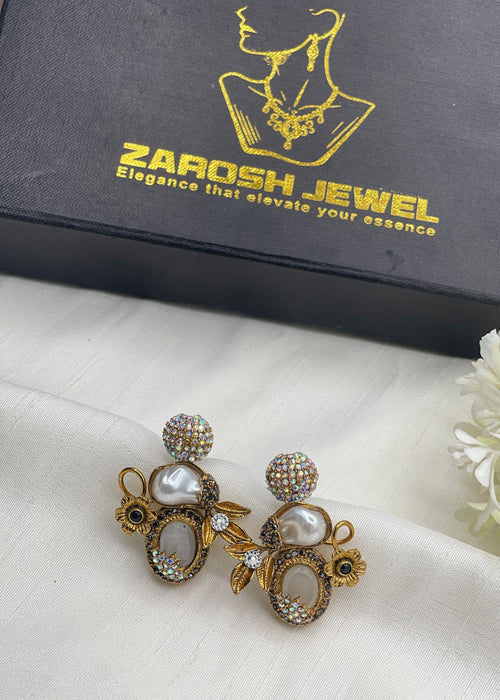 Shop the Nudhar Earrings from Zarosh Jewel