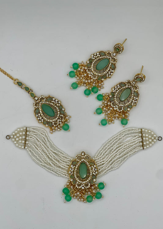 Shop the Serenelle Pearl Glow Choker Set from Zarosh Jewel