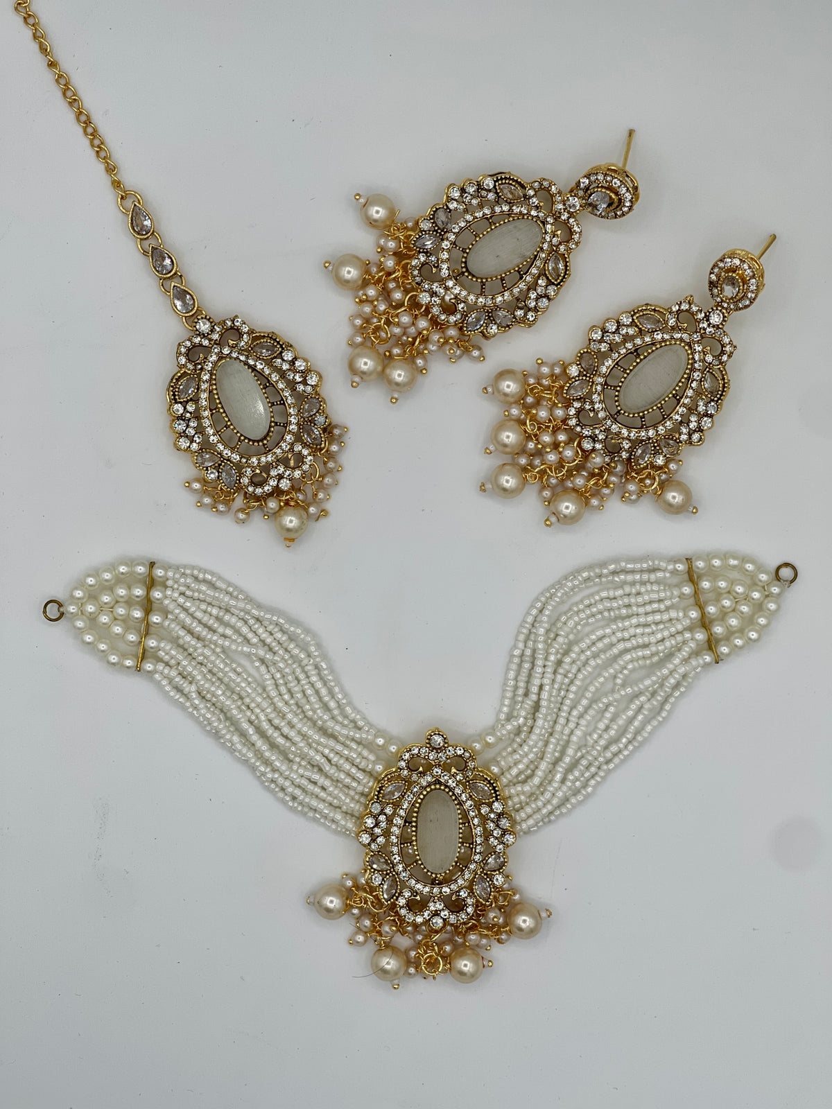 Shop the Serenelle Pearl Glow Choker Set from Zarosh Jewel