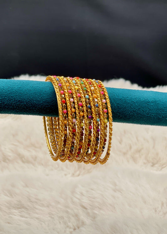 The Rangoli Kids Bangles Set by Zarosh Jewel