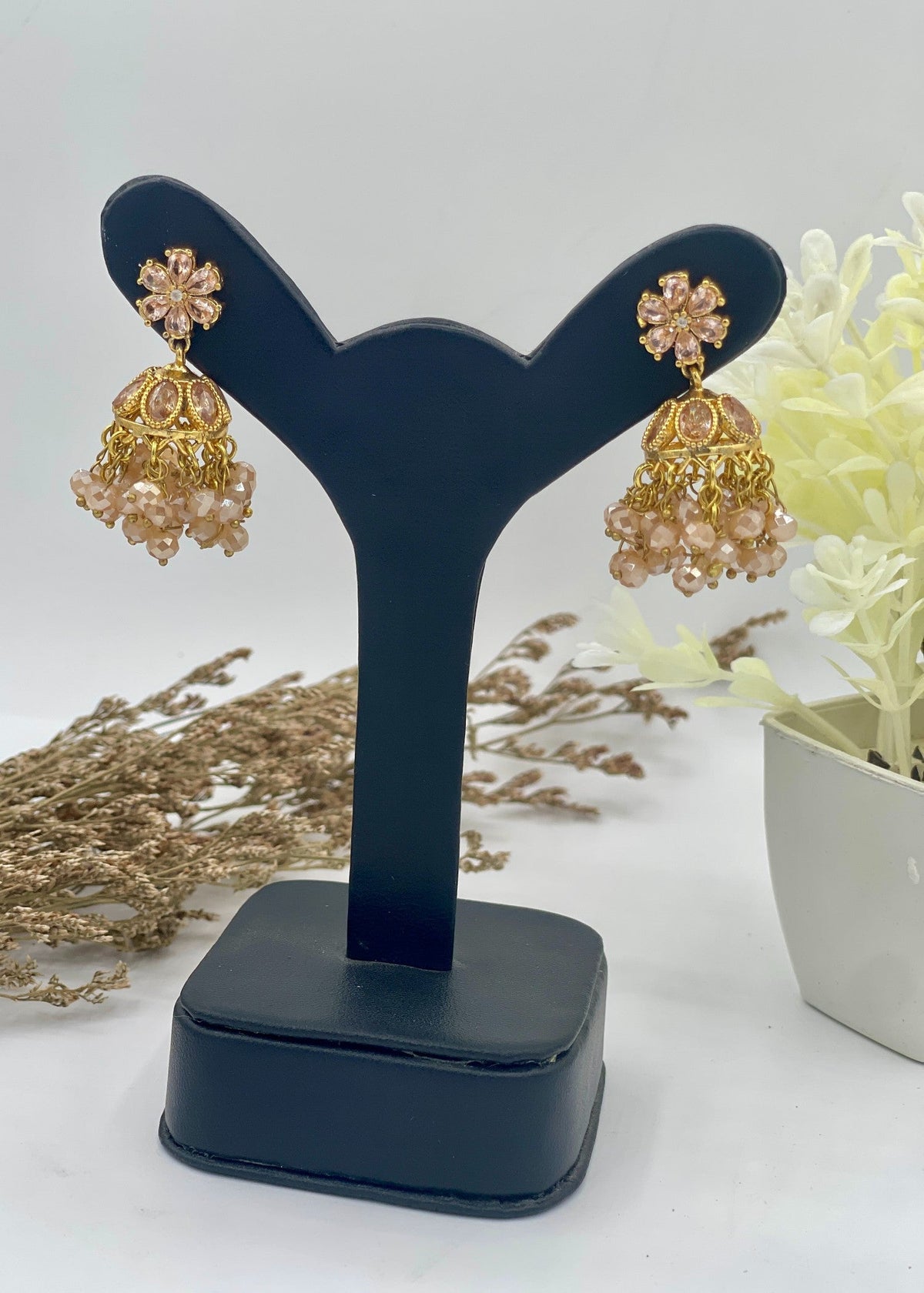Shop the Zarmin Royal Floral Jhumka Earrings from Zarosh Jewel