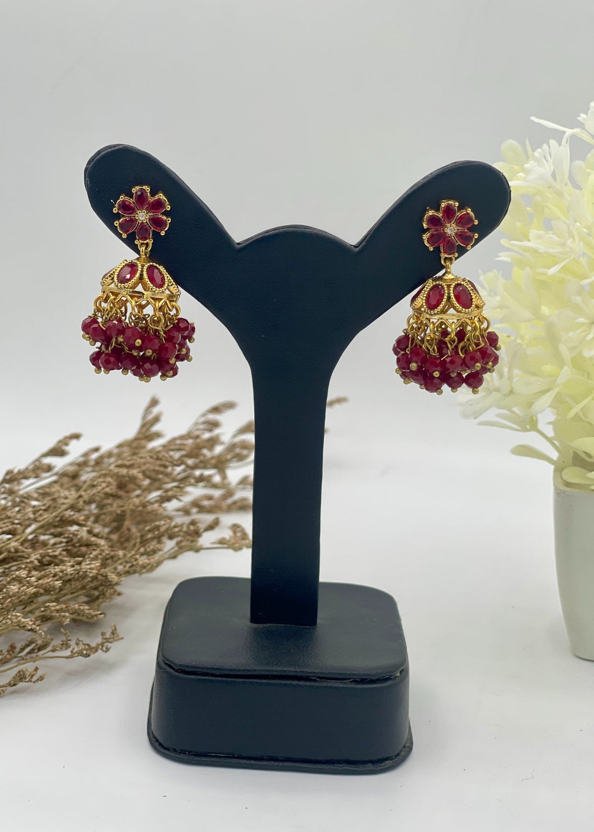 Shop the Zarmin Royal Floral Jhumka Earrings from Zarosh Jewel