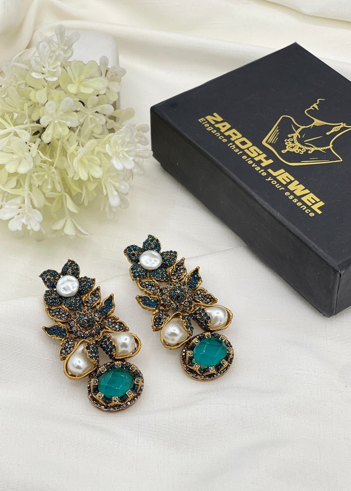 Shop the Zunairah Floral Drops from Zarosh Jewel